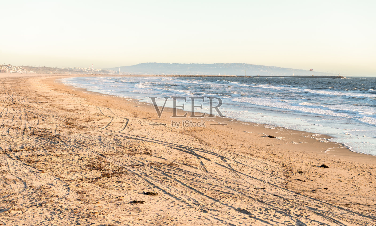 加州威尼斯海滩日落时分的沙滩照片摄影图片