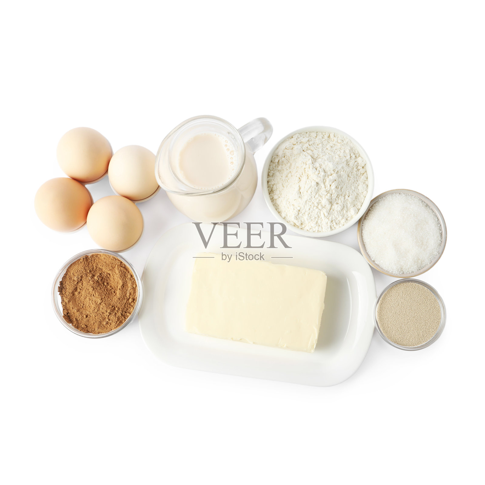 制作肉桂卷。不同的面团原料在白色背景上分开展示，俯视图。照片摄影图片