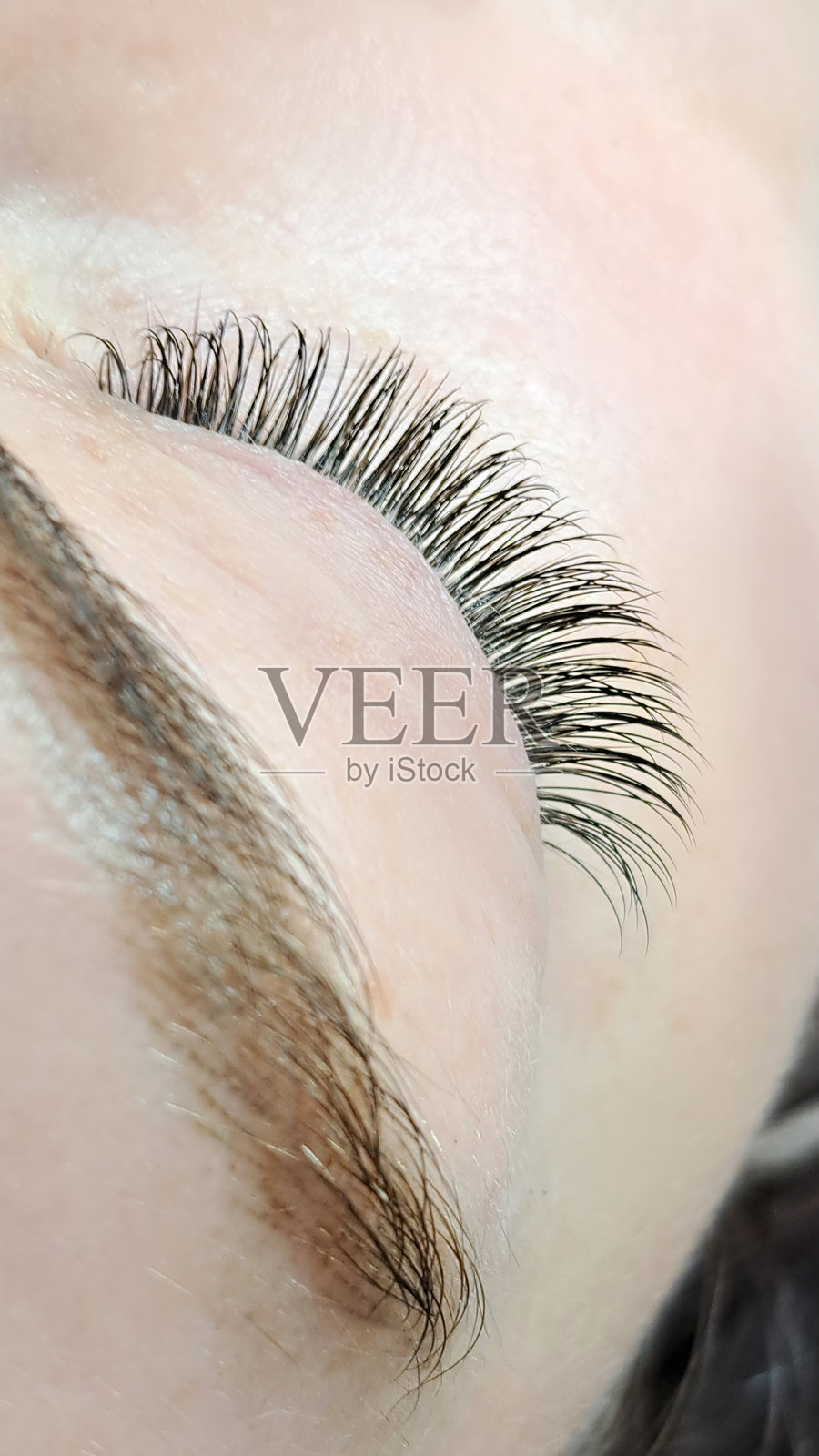 眼睛特写，带有睫毛延长，美容院护理，2D卷翘，3D卷翘，经典睫毛，俄罗斯卷翘，超大卷翘，新一套照片摄影图片