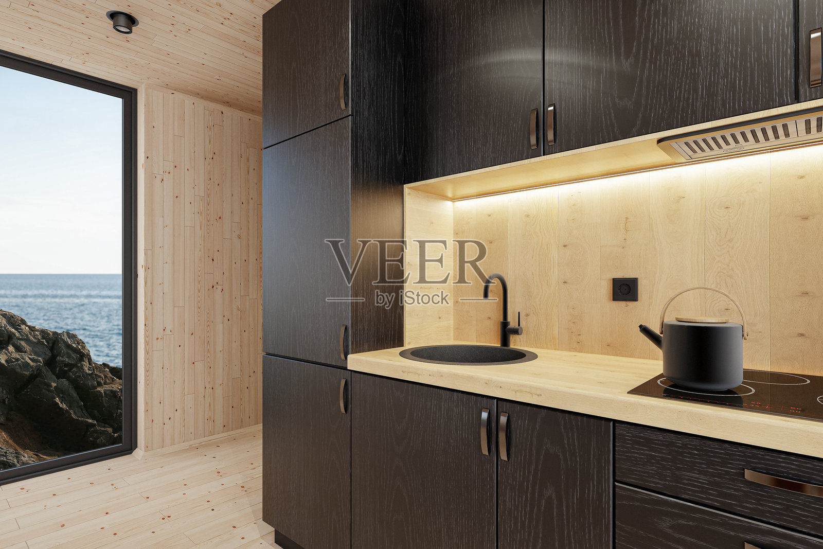 斯堪的纳维亚风格木屋内小巧紧凑的黑色厨房特写照片摄影图片