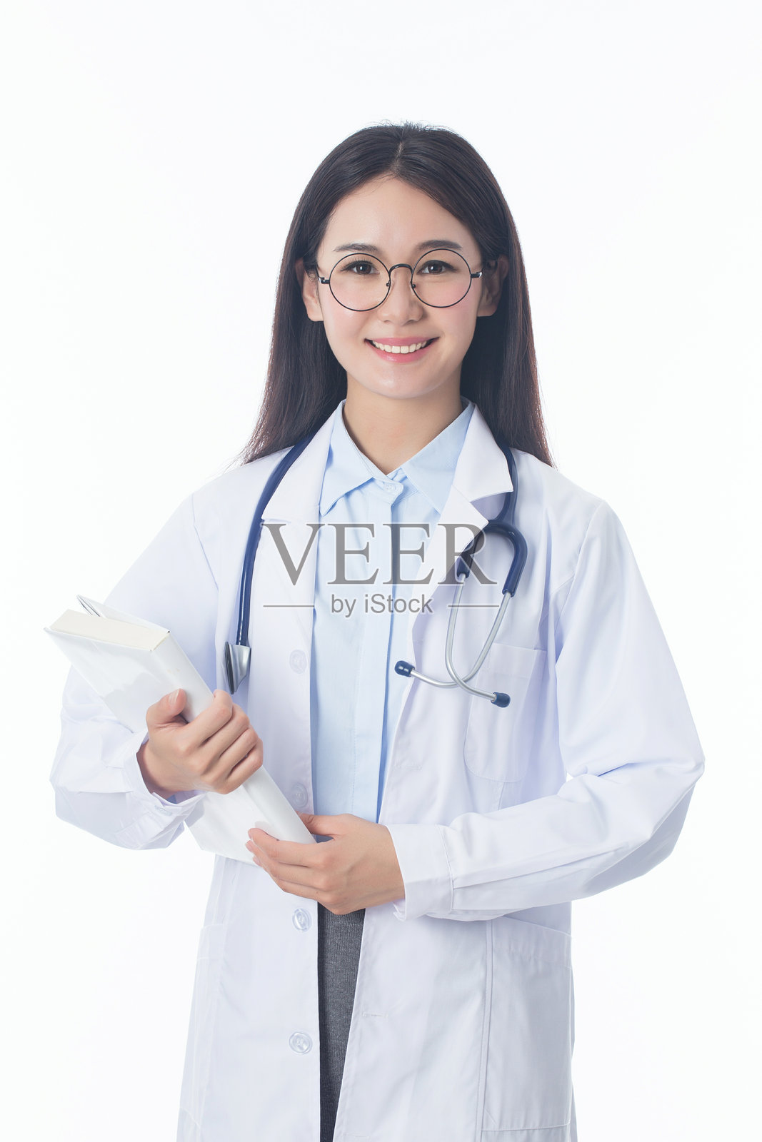 手持医生听诊器的女性肖像照片摄影图片