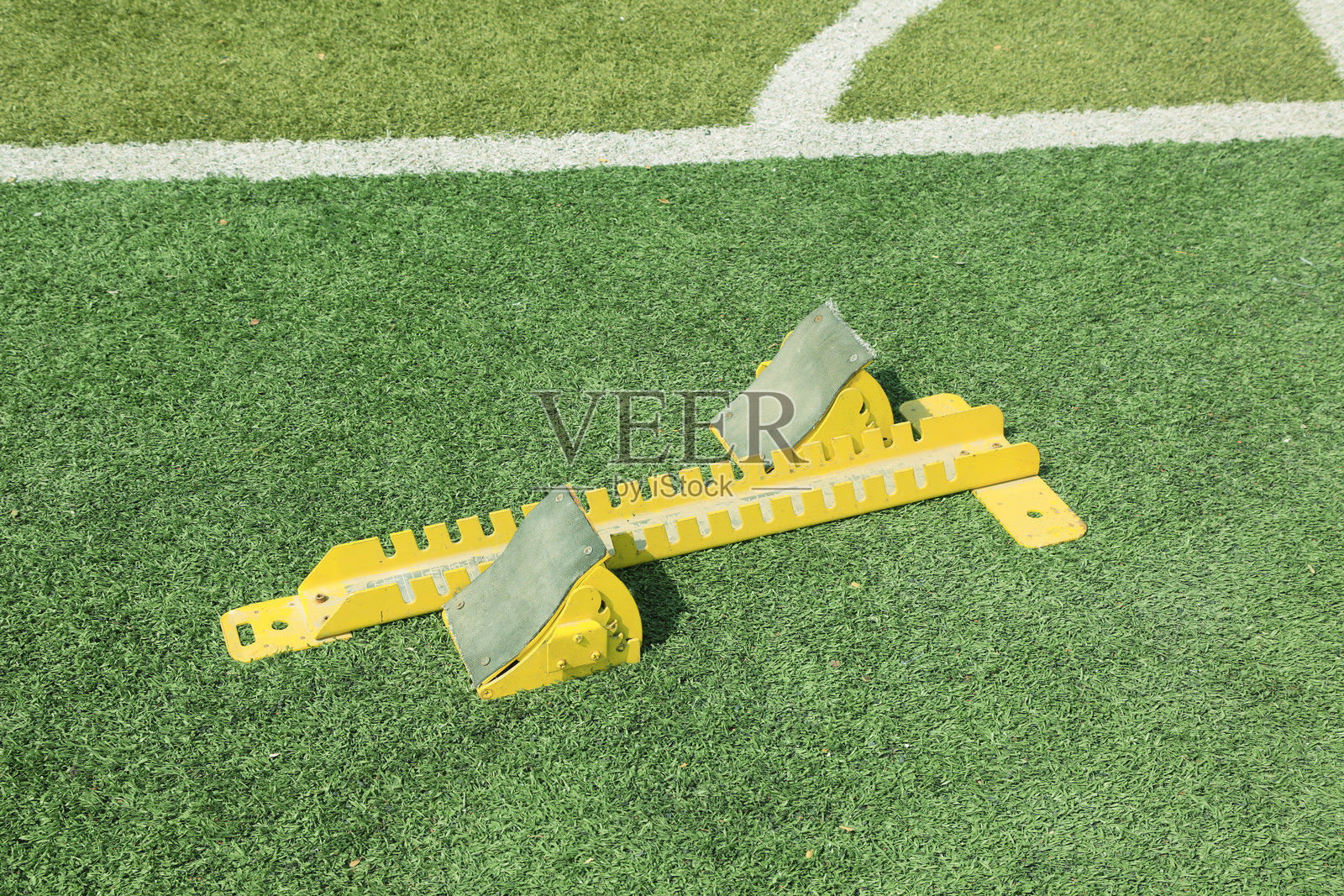 绿色塑料起跑器照片摄影图片