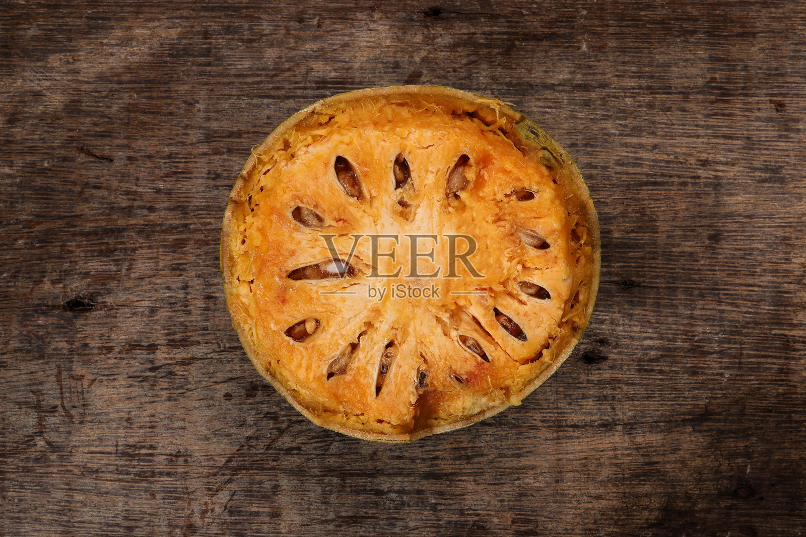 东南亚木苹果（巴尔果）果实，酸果（Limonia acidissima），坚硬的外壳，内部果肉，制作果汁饮料的原料。照片摄影图片