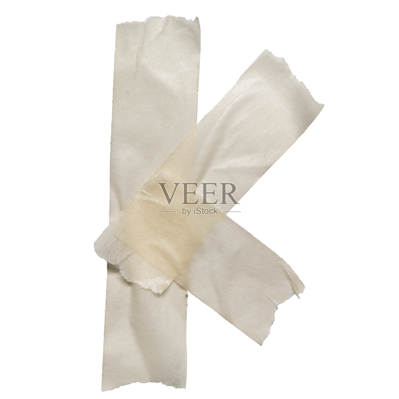 用米白色胶带制作的字母K照片摄影图片