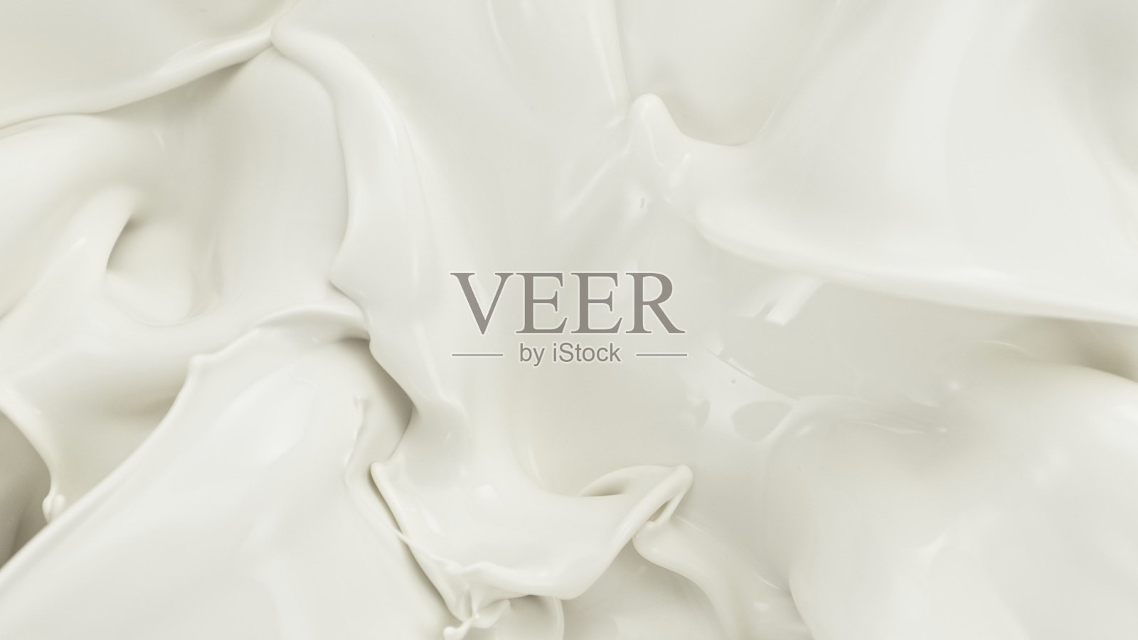 液体奶油飞溅，俯视构图。照片摄影图片