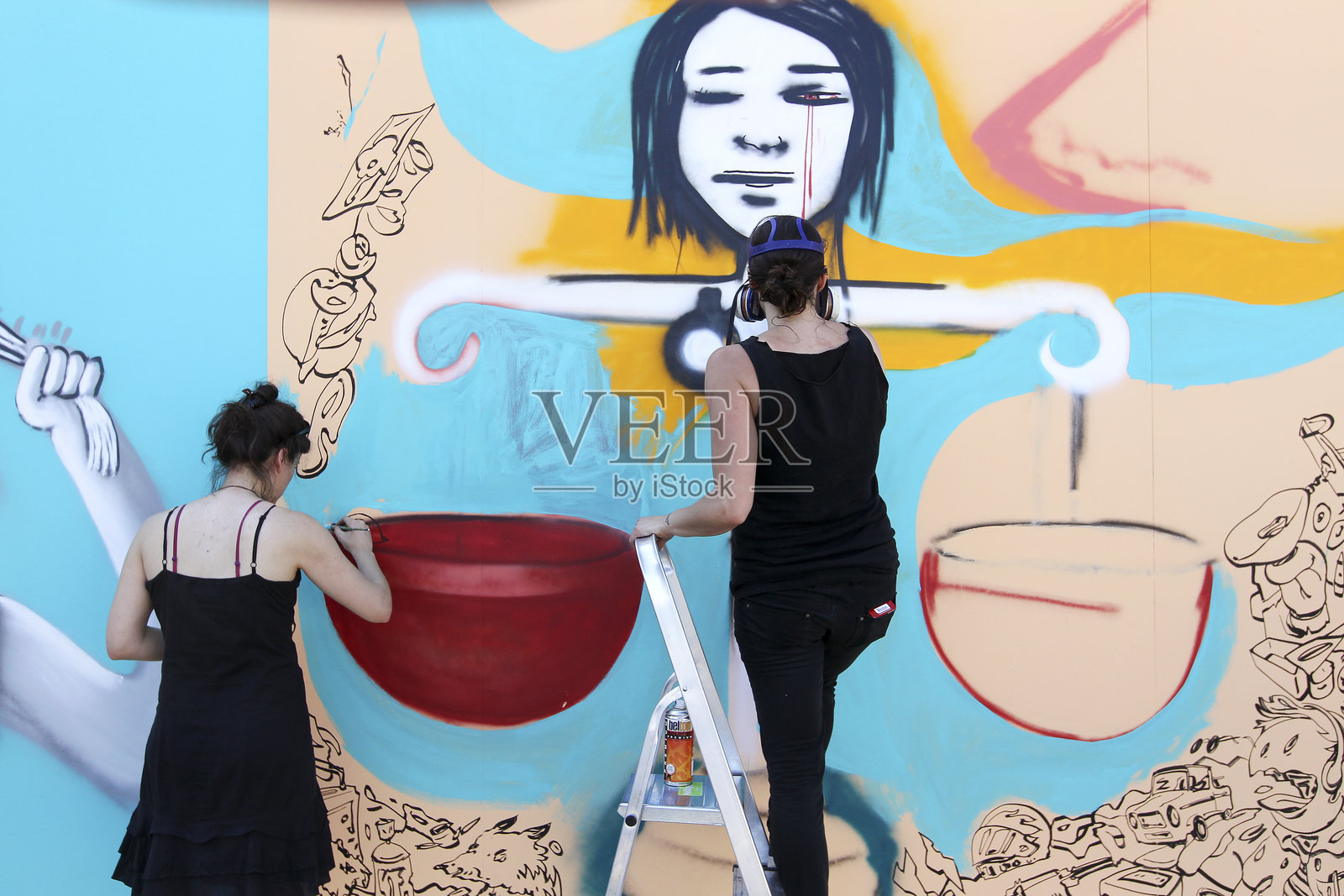 街头艺术节期间的涂鸦画家照片摄影图片