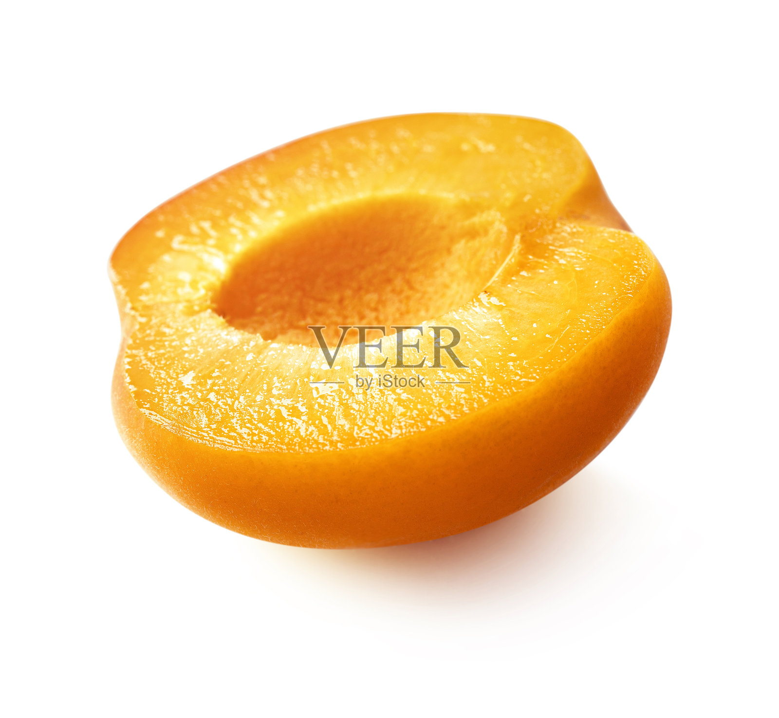 杏子半个。照片摄影图片