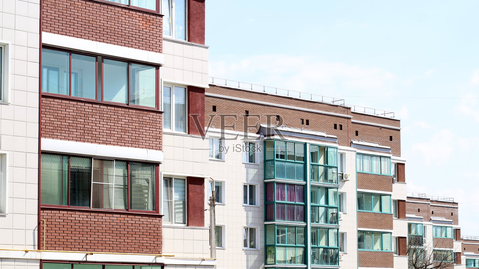 现代建筑的外立面，新住宅开发项目。照片摄影图片