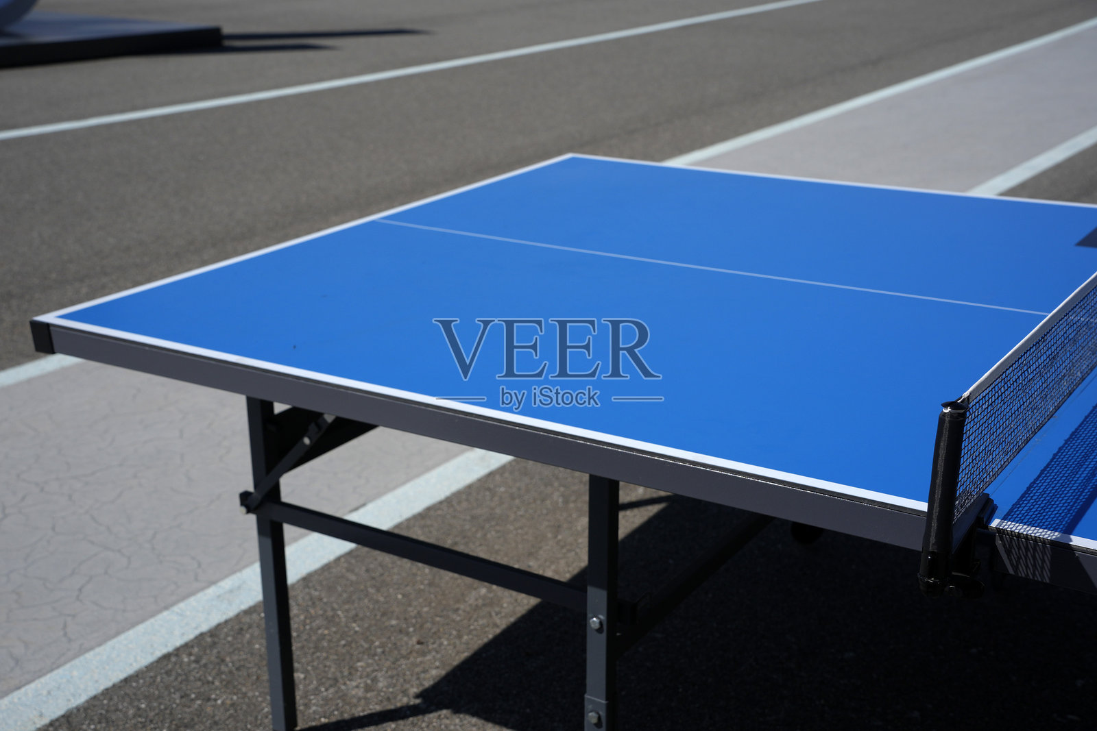 蓝色乒乓球桌网细节照片摄影图片