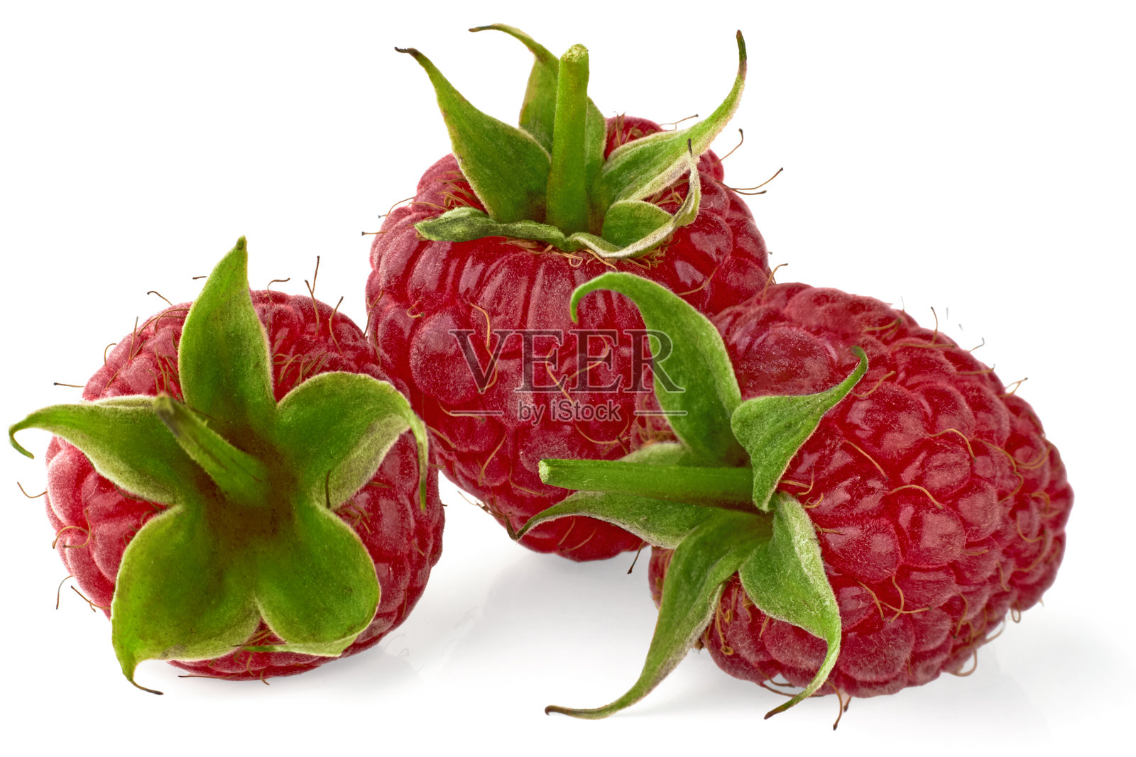 三颗覆盆子孤立在白色背景上照片摄影图片