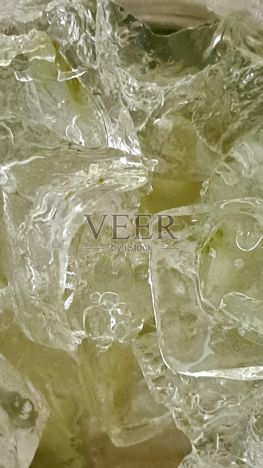 绿色液体中的冰块纹理背景照片摄影图片
