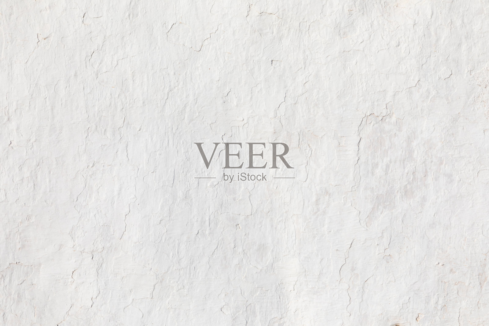 白色石膏房屋墙壁的图案，表面有白色剥落的油漆照片摄影图片