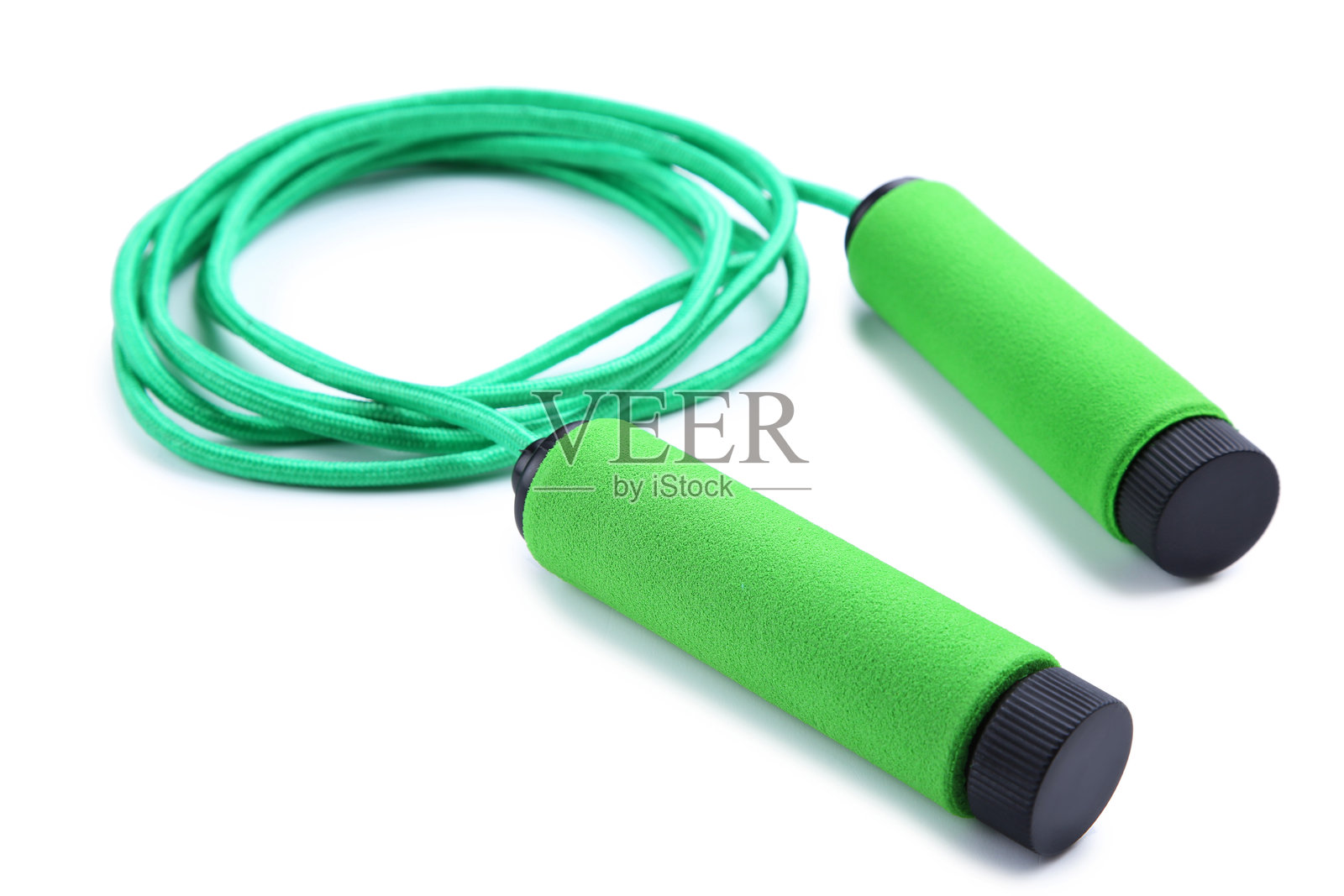 绿色跳绳孤立在白色背景上照片摄影图片