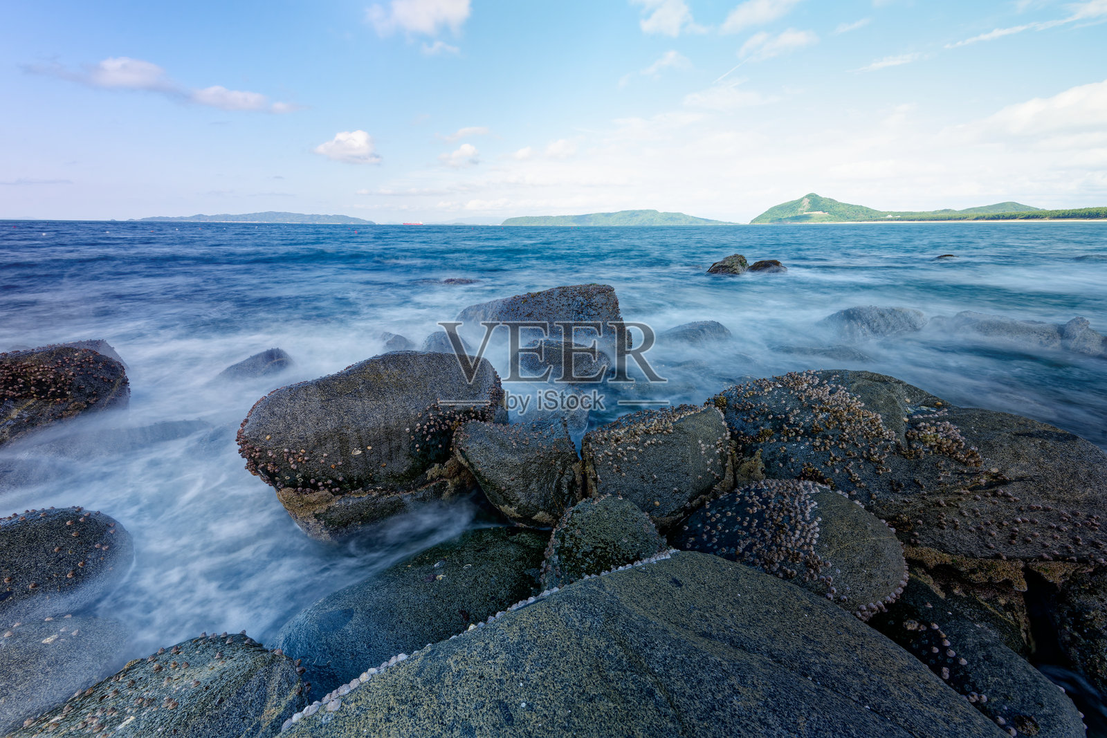 玄海海域岩石上的波浪照片摄影图片