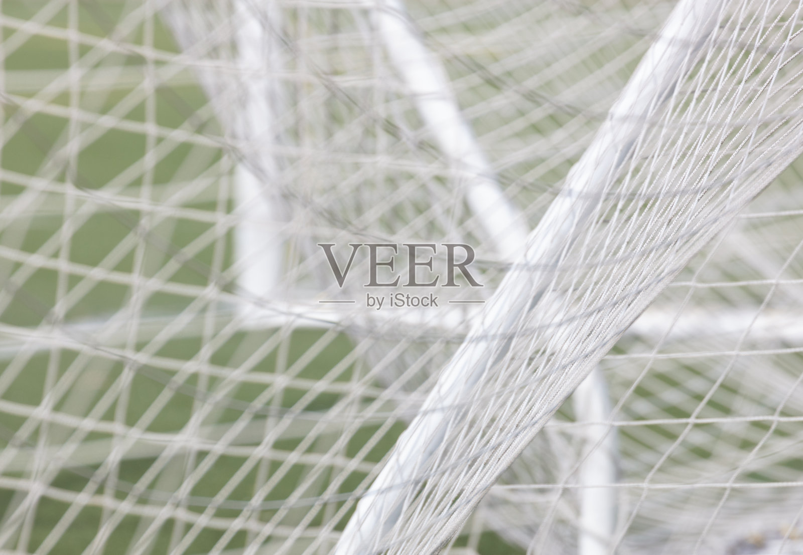 足球网和球门的特写镜头照片摄影图片