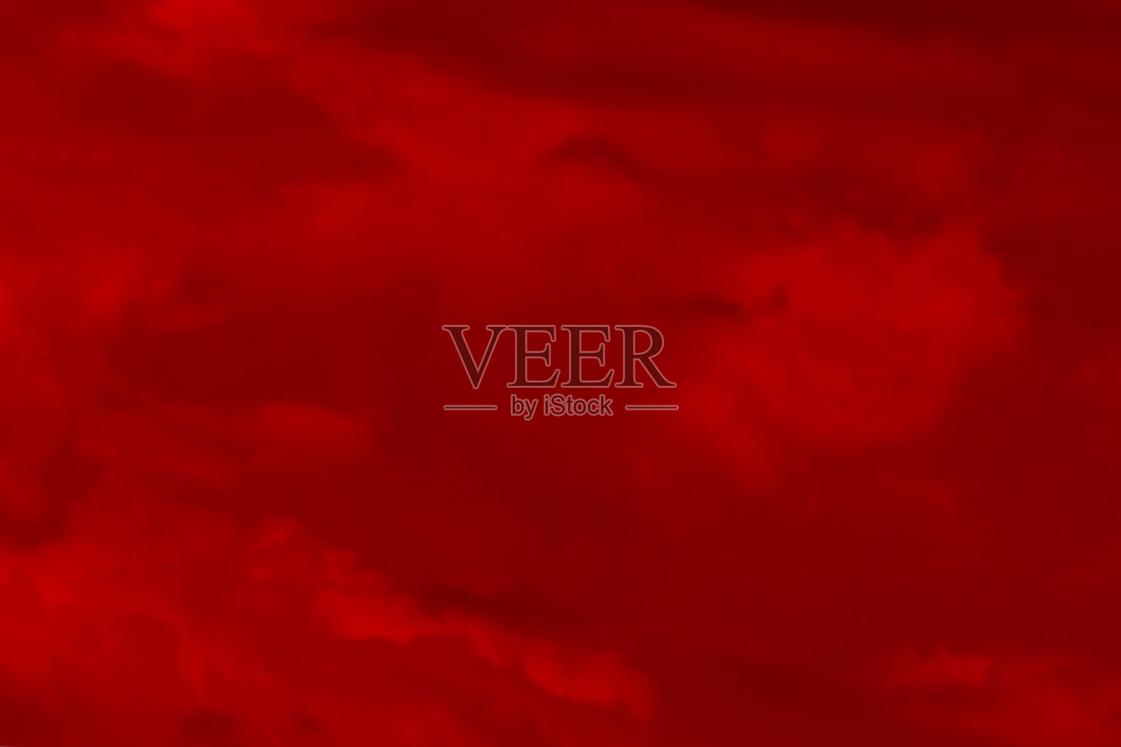 红色云彩纹理背景。模糊的红色天空与云朵的照片。照片摄影图片