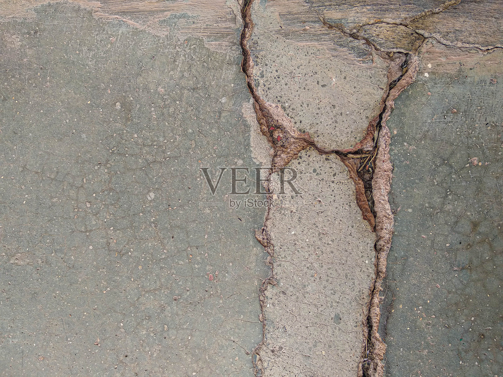 破裂混凝土的纹理。照片摄影图片