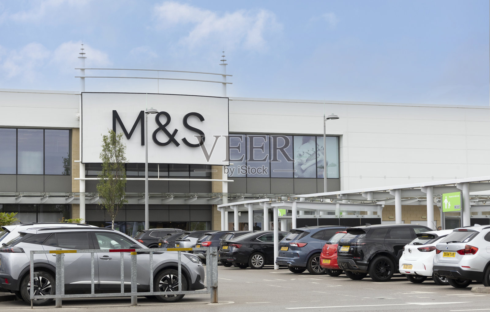 马莎食品厅的标识和景观。照片摄影图片