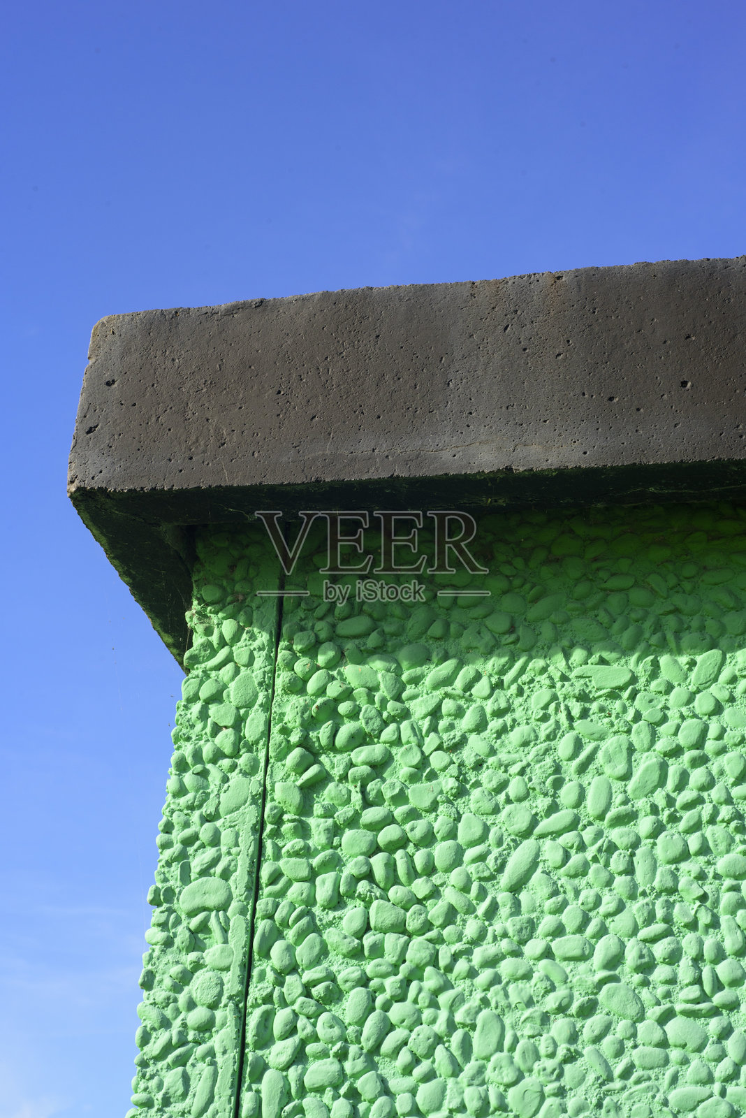 户外石质表面绿色墙壁照片摄影图片