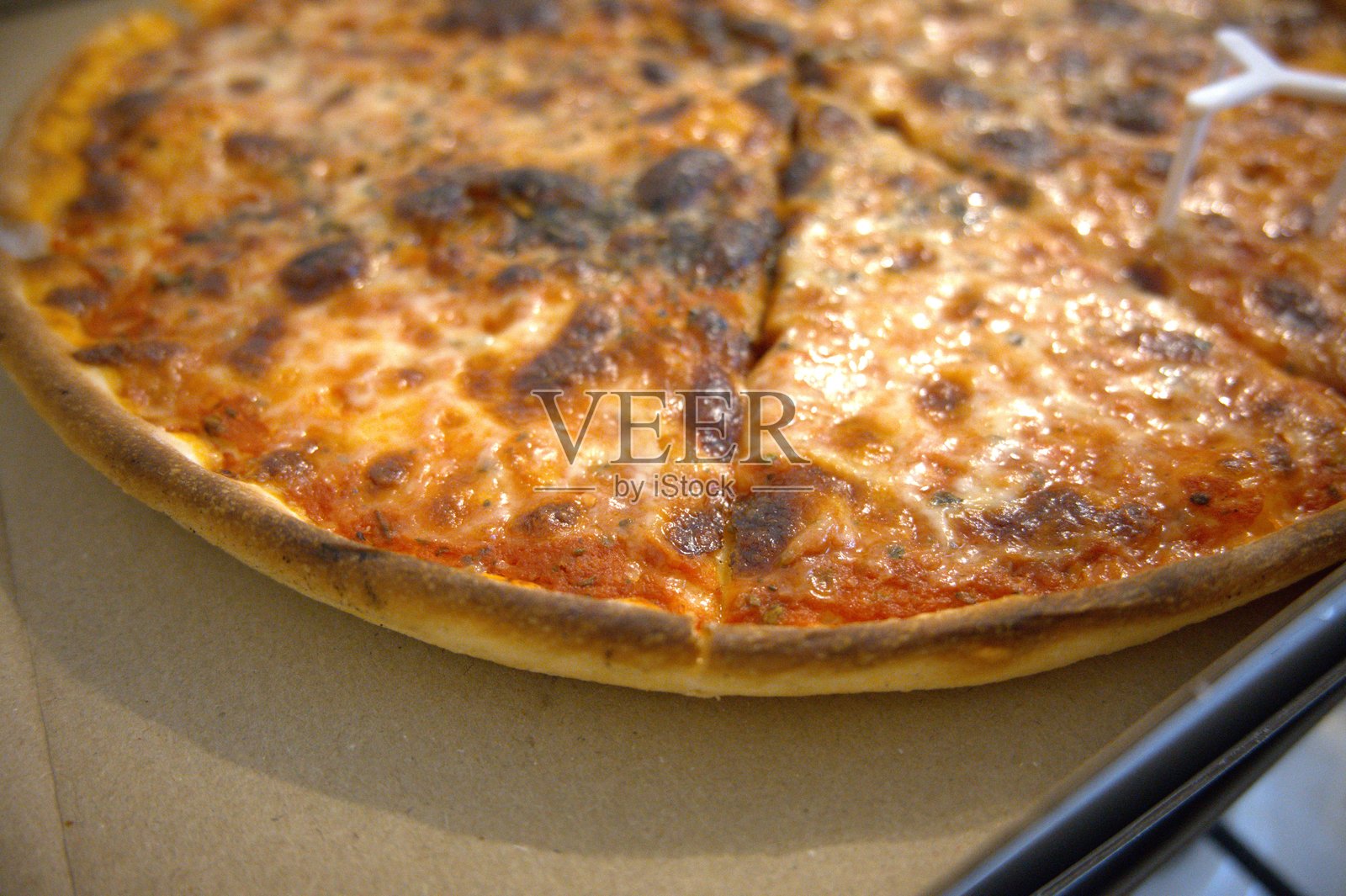 玛格丽塔披萨特写在盒子里。照片摄影图片