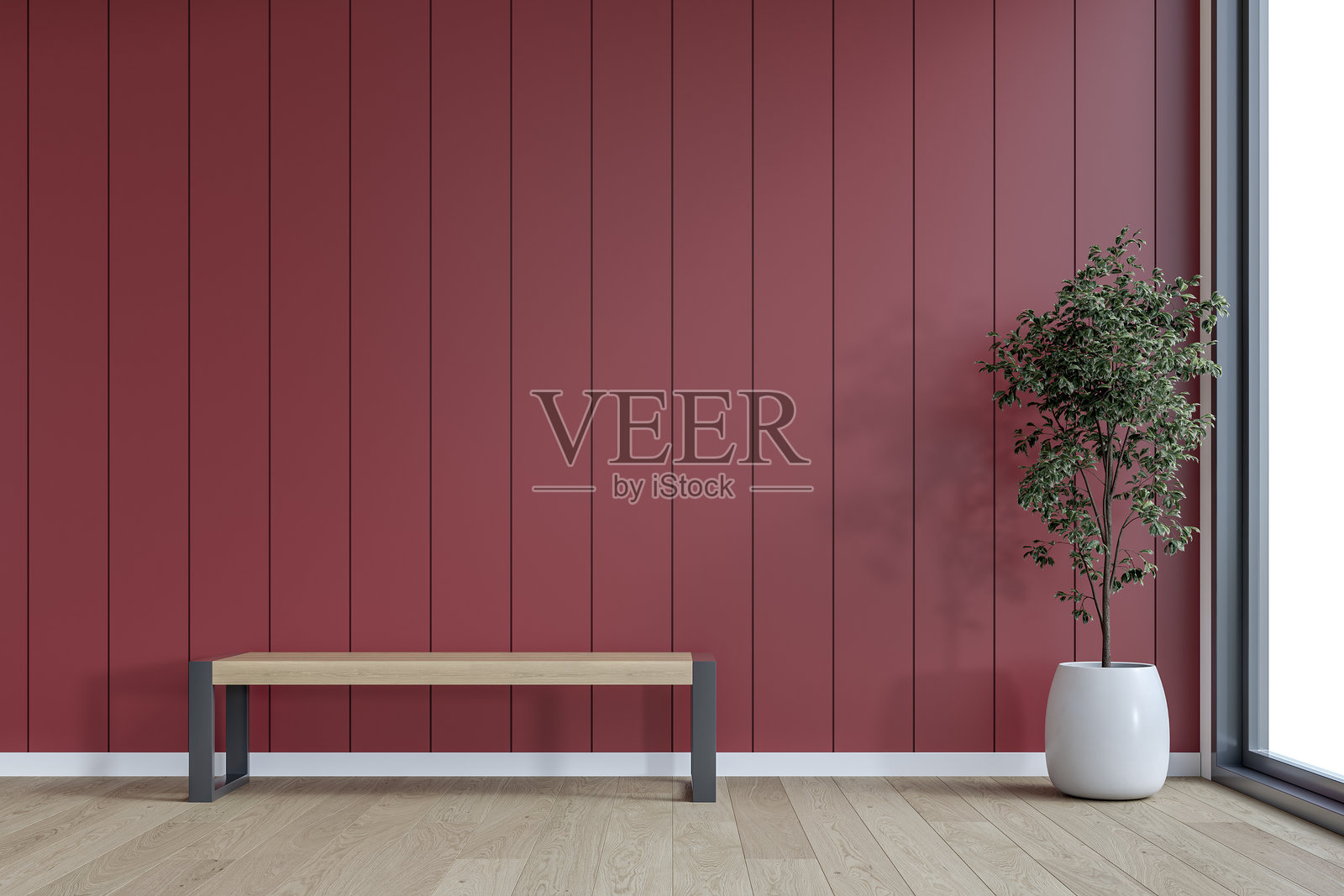 一个极简主义的室内环境，前面有一张木长椅和一盆植物，背景是空荡荡的托斯卡纳红色面板墙，留有空白空间，窗户和装饰品。照片摄影图片