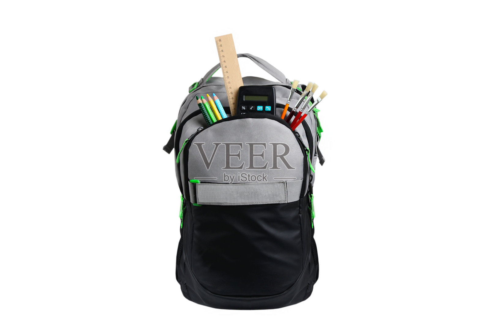 灰色书包与文具在白色背景上照片摄影图片