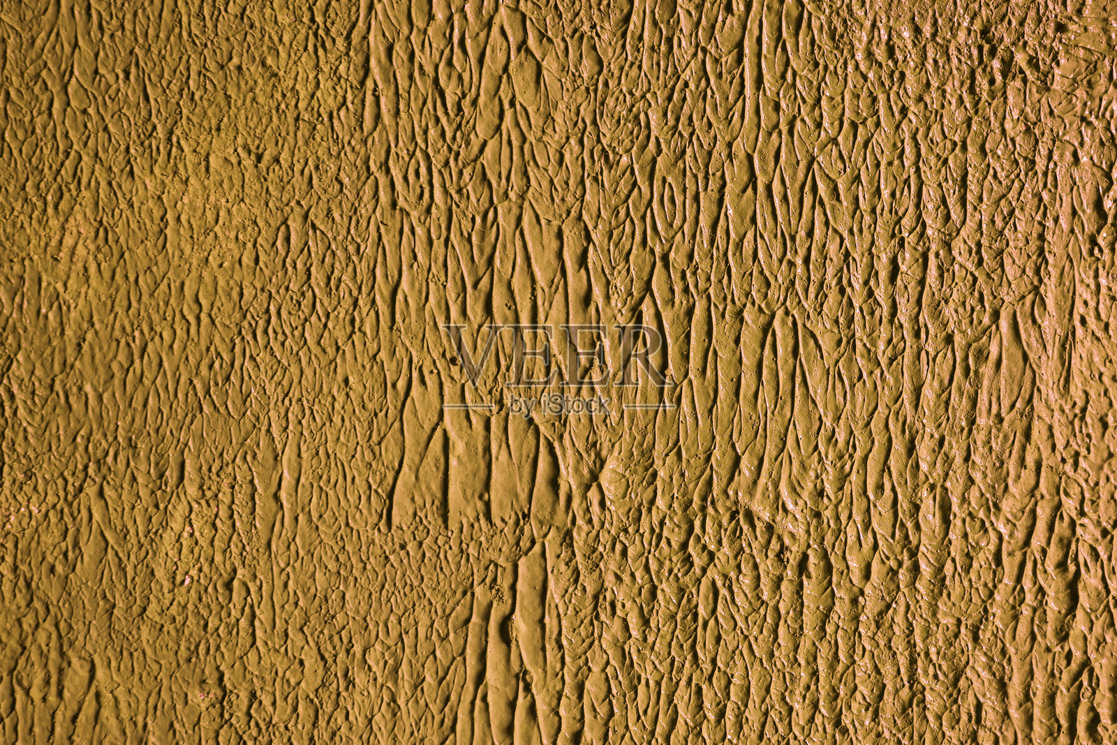 橙色粗糙抹灰的抽象背景。照片摄影图片