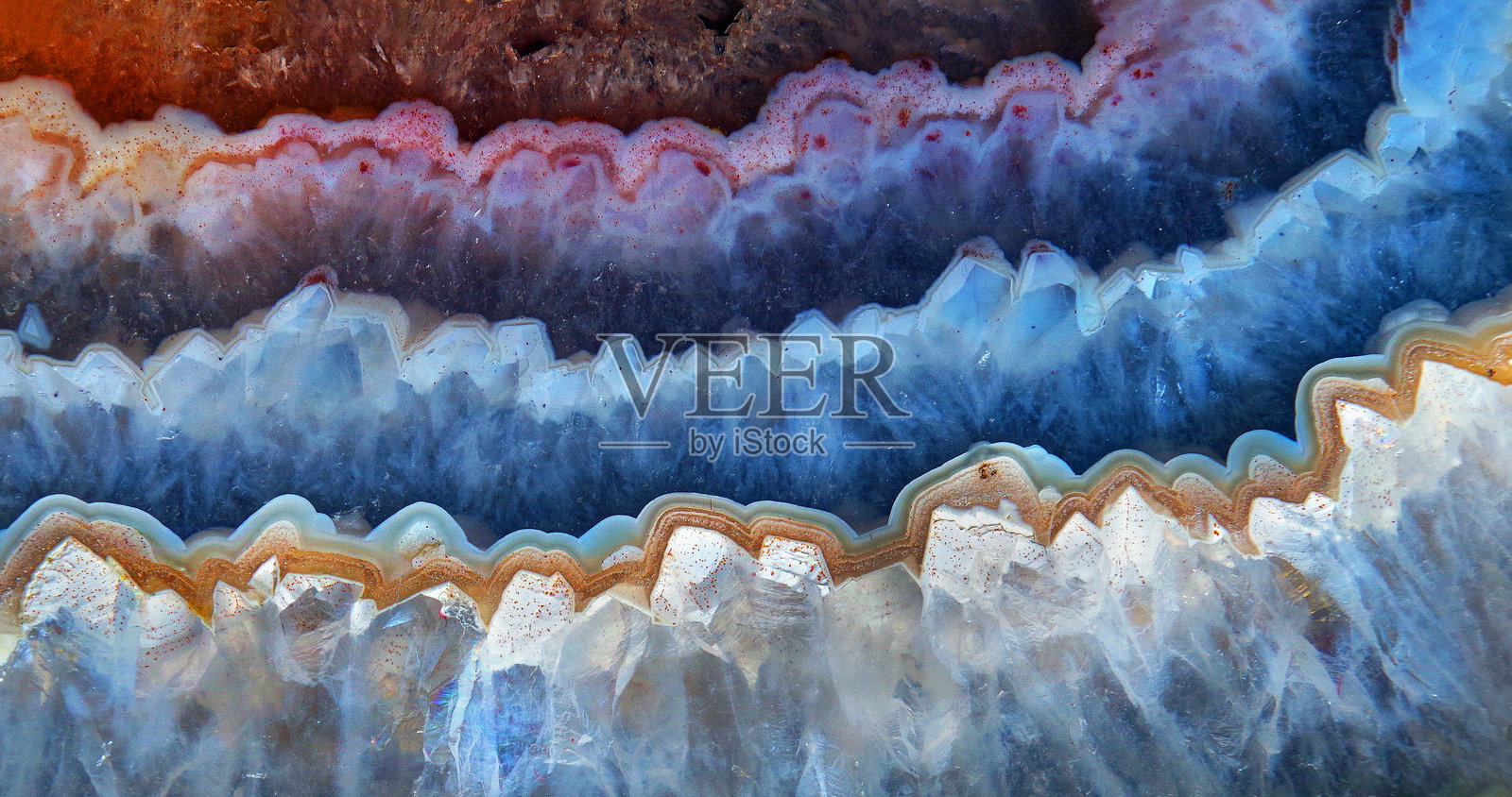 抽象自然图案。石英玛瑙纹理背景。天然石材装饰特写。照片摄影图片