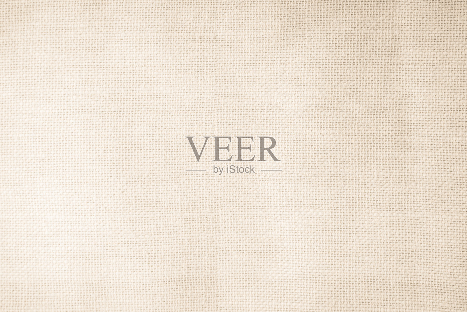 自然图案的棕色麻布编织纹理背景。浅米色奶油色的黄麻布、亚麻背景，空白。编织的帆布纤维线棉布质感如同有机材料。照片摄影图片