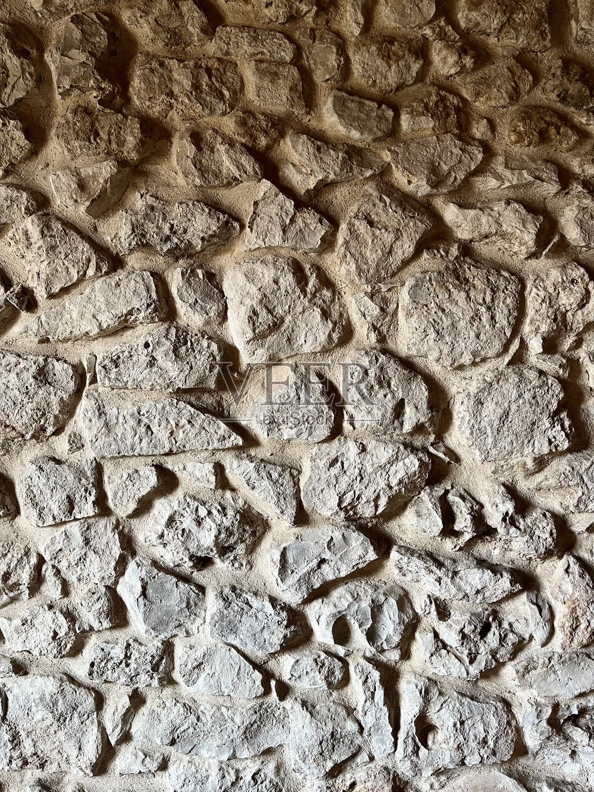 乡村风格石墙纹理的特写图像，适用于多种应用照片摄影图片