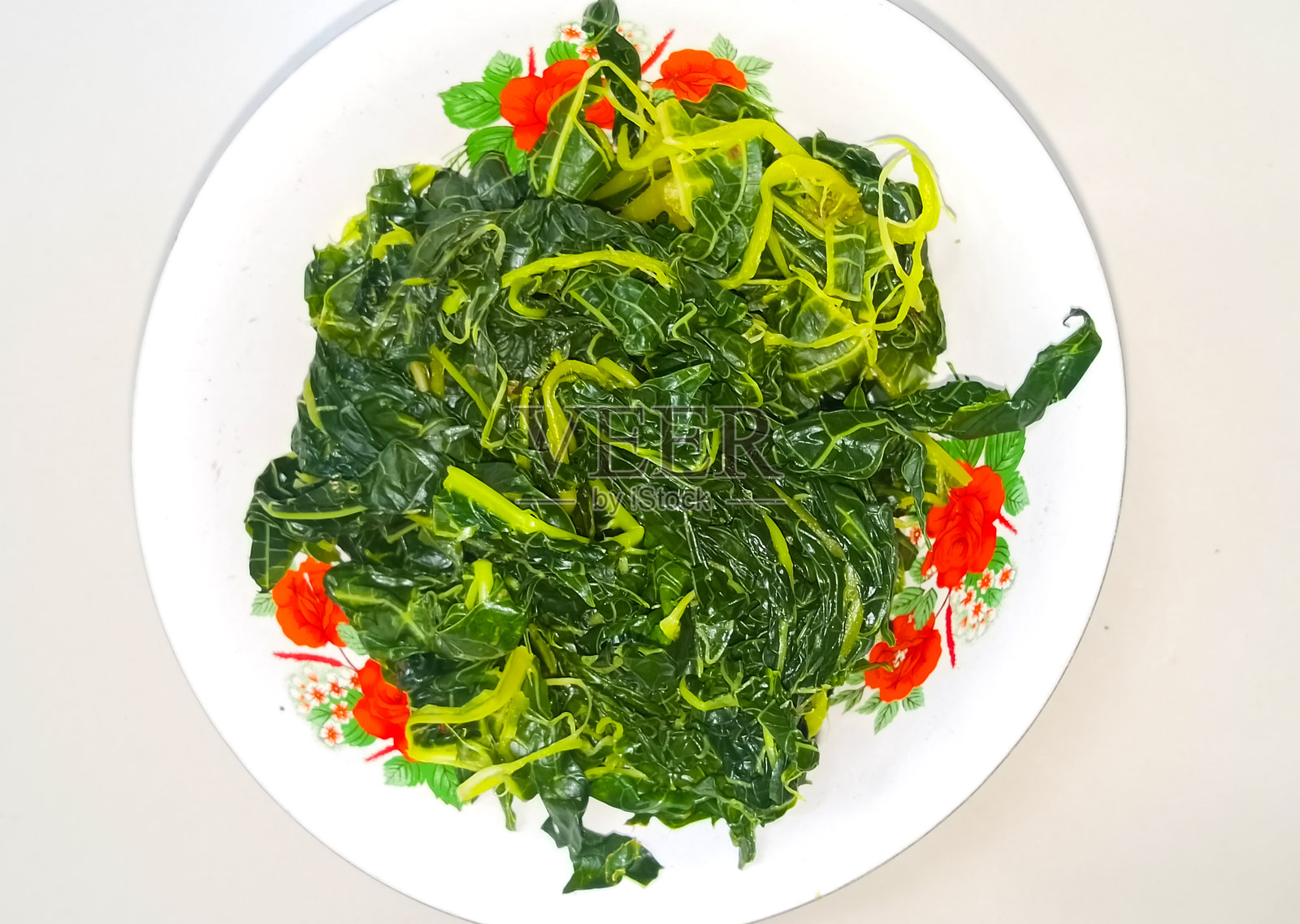 盘子里的菠菜蔬菜食品照片摄影图片