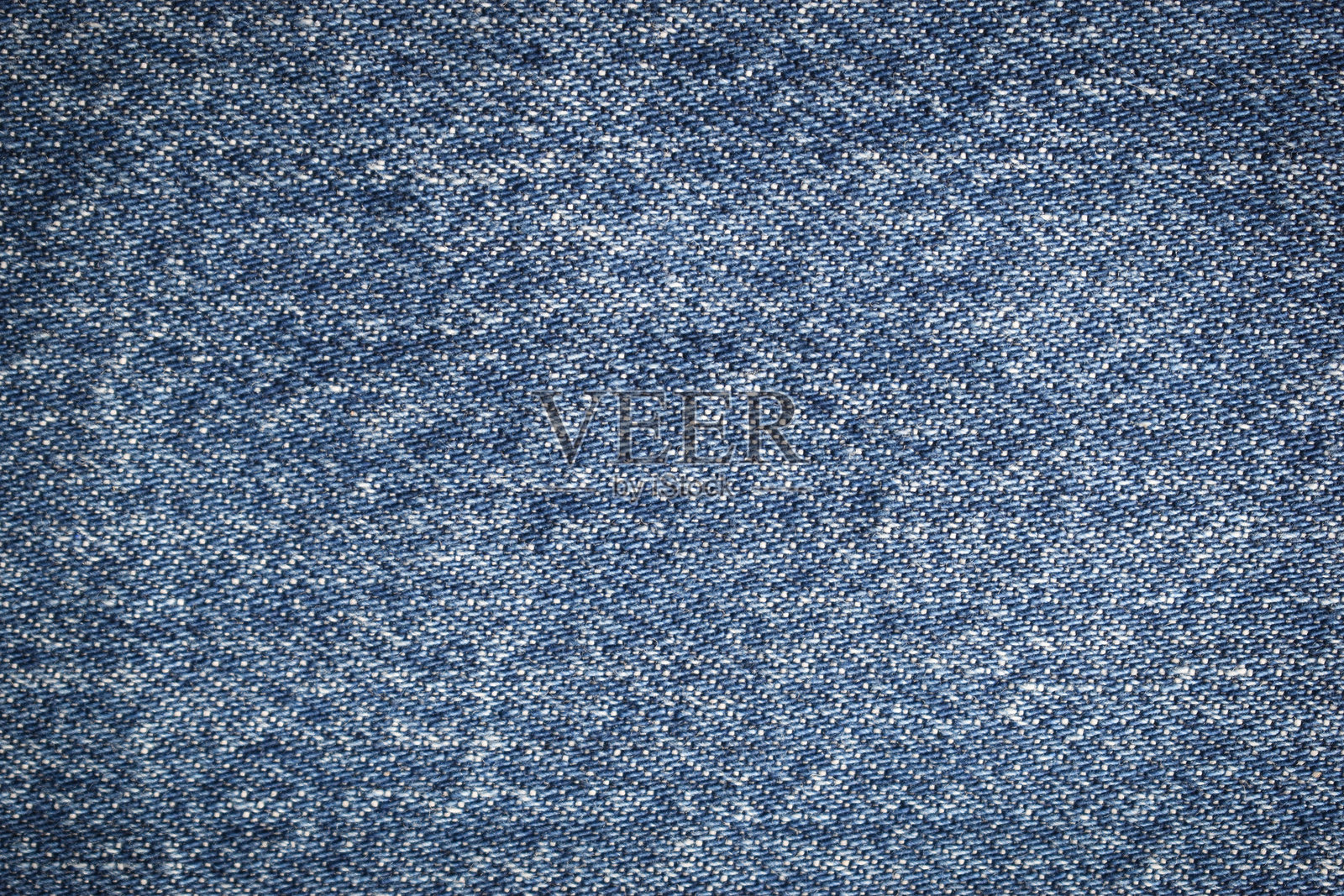 蓝色牛仔布纹理背景，牛仔面料时尚风格照片摄影图片