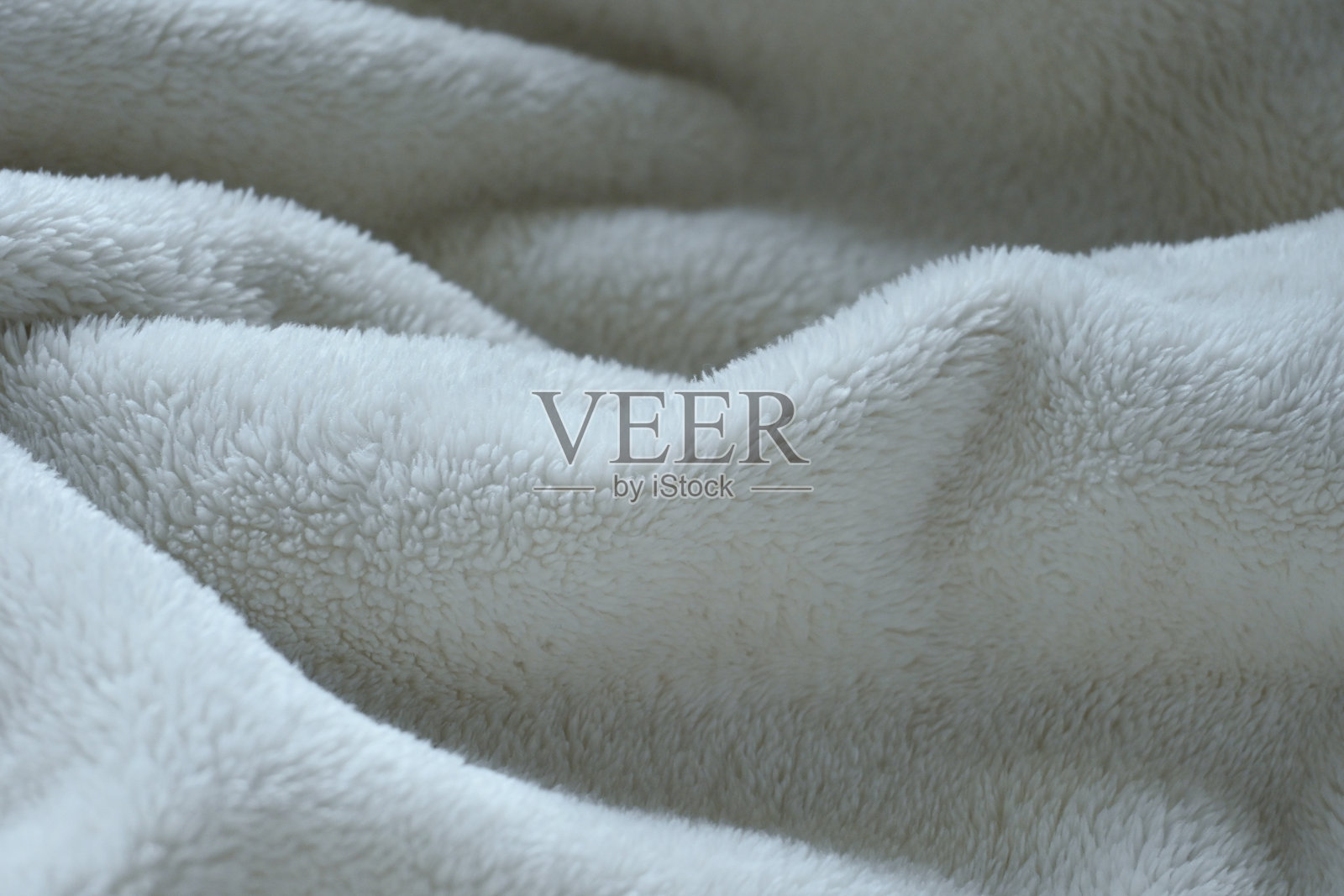 白色柔软蓬松的毛毯织物照片摄影图片
