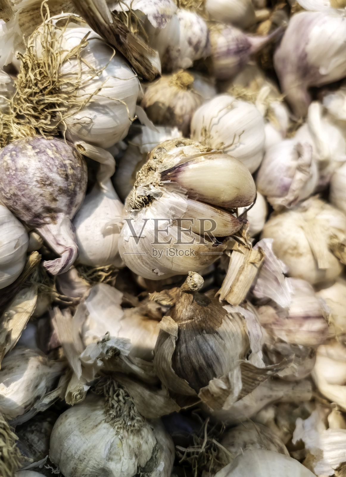 市场上的干蒜照片摄影图片