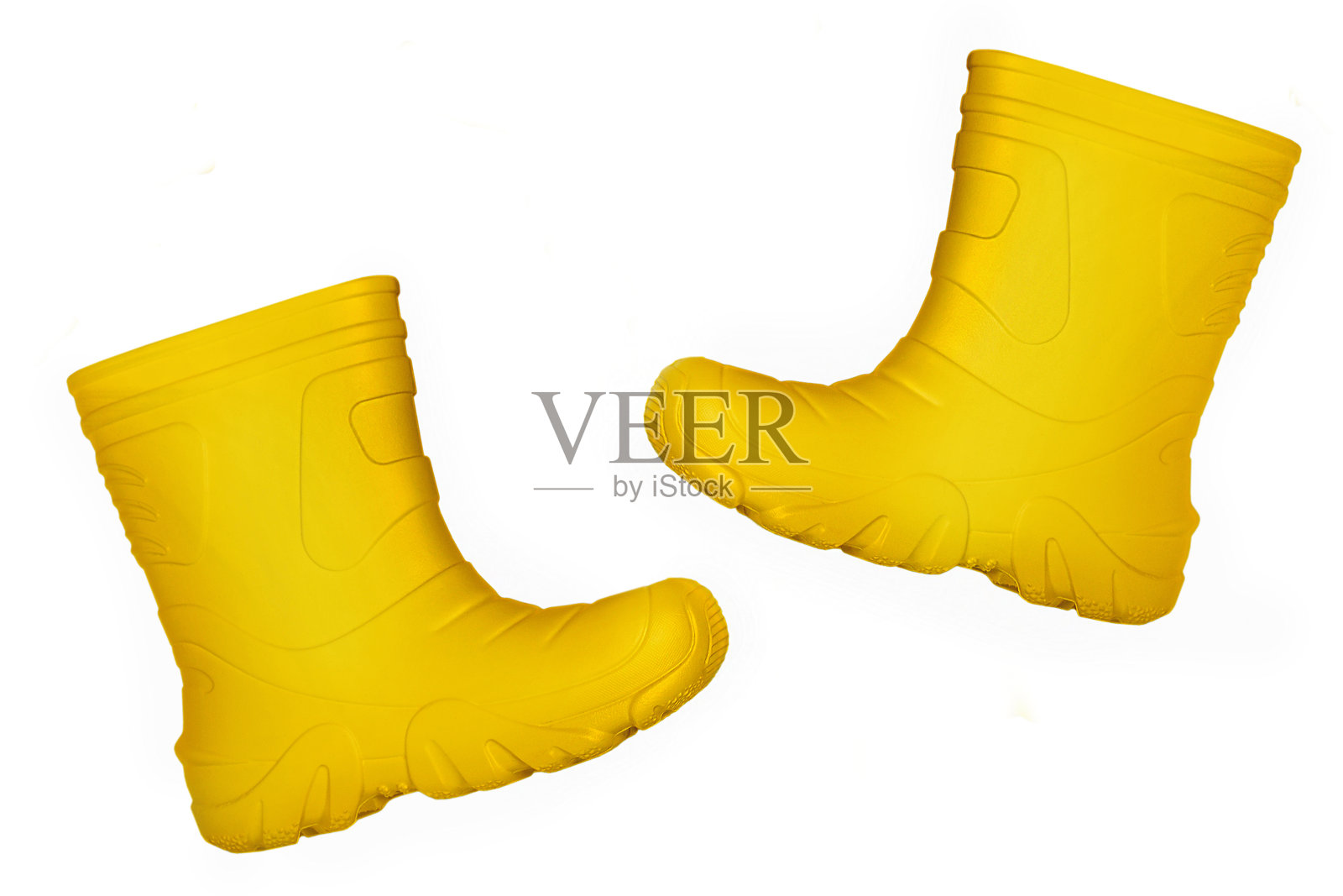 一双橙色儿童橡胶靴，孤立在白色背景上照片摄影图片