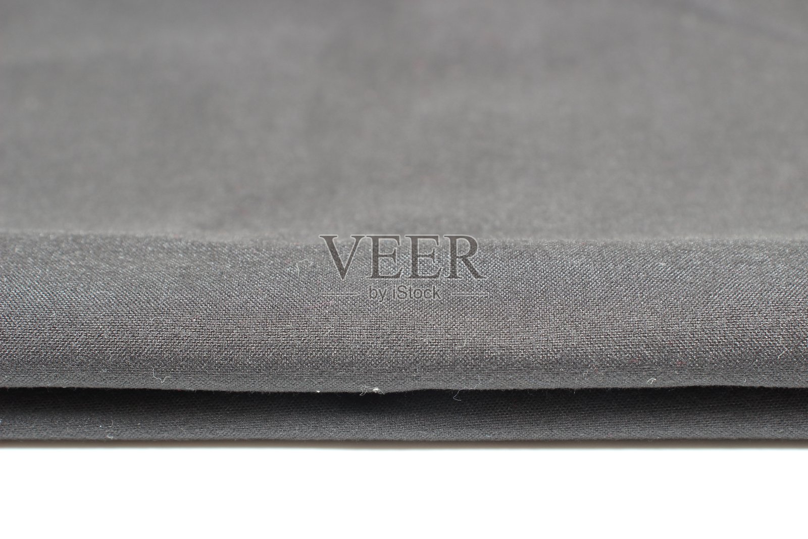 灰色织物，营造出宁静的氛围。照片摄影图片