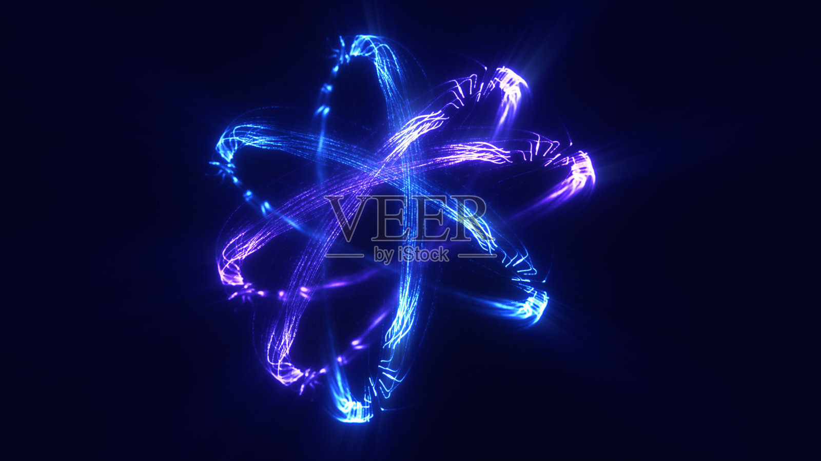 发光的右侧能量环，形状像原子，伴有旋转的蓝色和紫色光带照片摄影图片