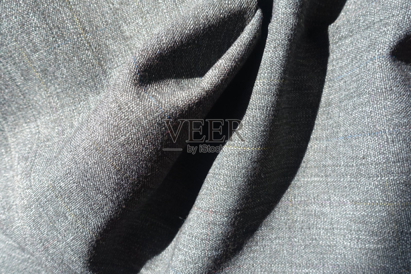 盐和胡椒聚酯面料上的柔软褶皱照片摄影图片