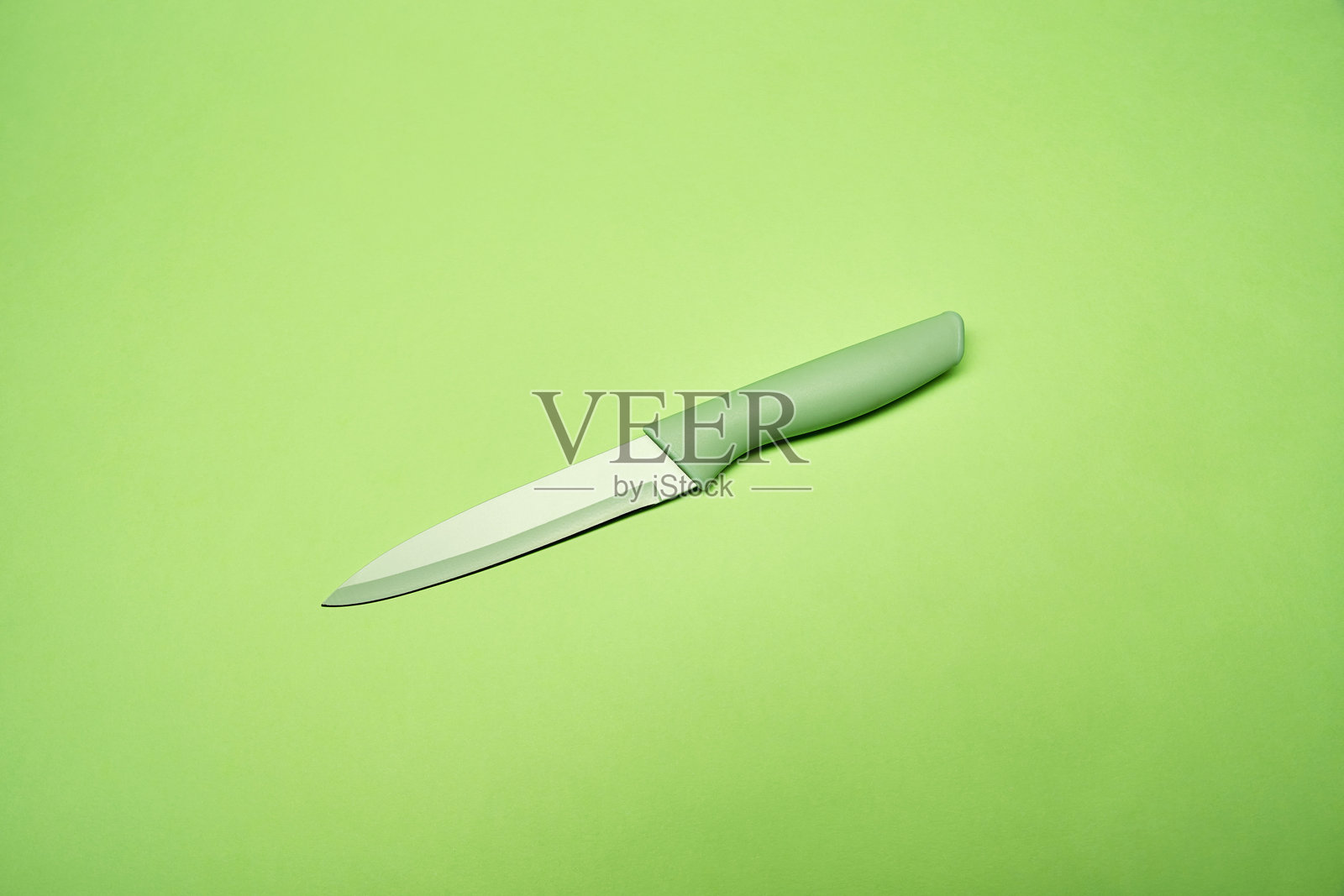 绿色厨师的厨房刀照片摄影图片