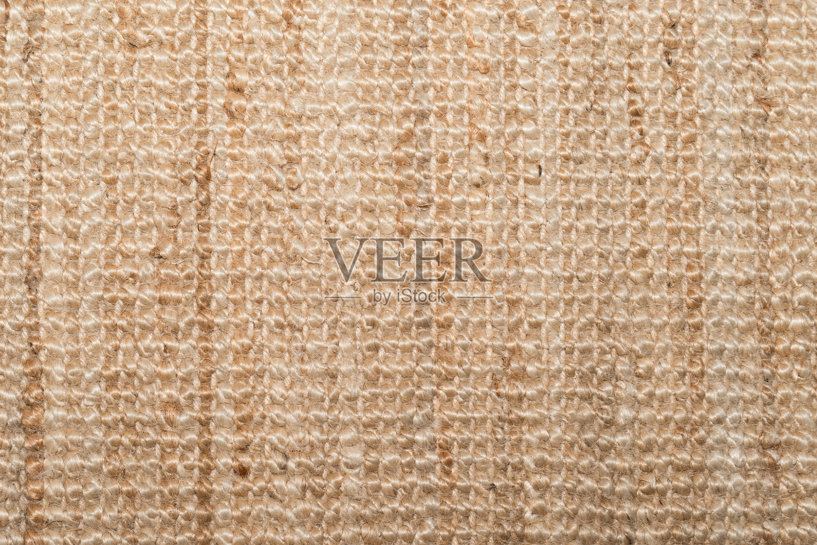 米色纹理地毯表面的俯视图照片摄影图片