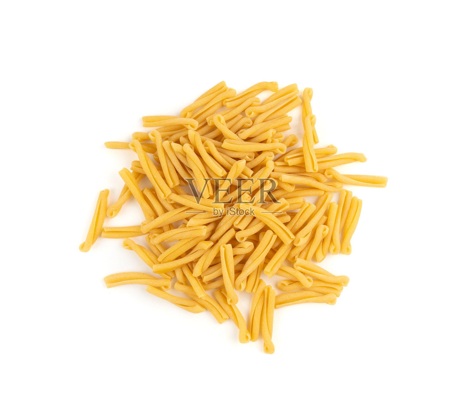 干燥的传统卡萨雷切意大利面，生卡萨雷切，小麦面条，意大利菜肴原料照片摄影图片