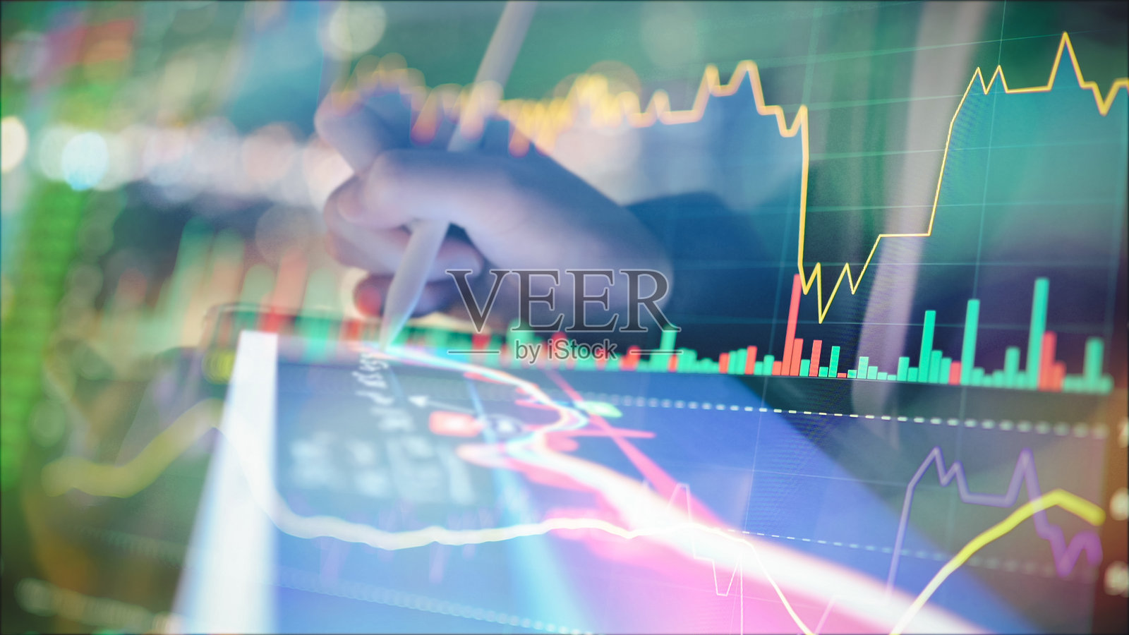 投资者使用数位笔在平板屏幕上探索股票图表，配有人工智能驱动的金融图形叠加和交易指标，显示实时交易表现和投资分析，呈现在未来感十足的平板界面上。照片摄影图片