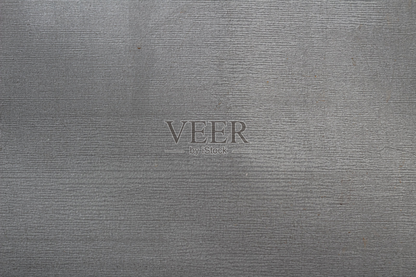 特写的灰色纹理表面，具有明显的水平线条形成的图案照片摄影图片