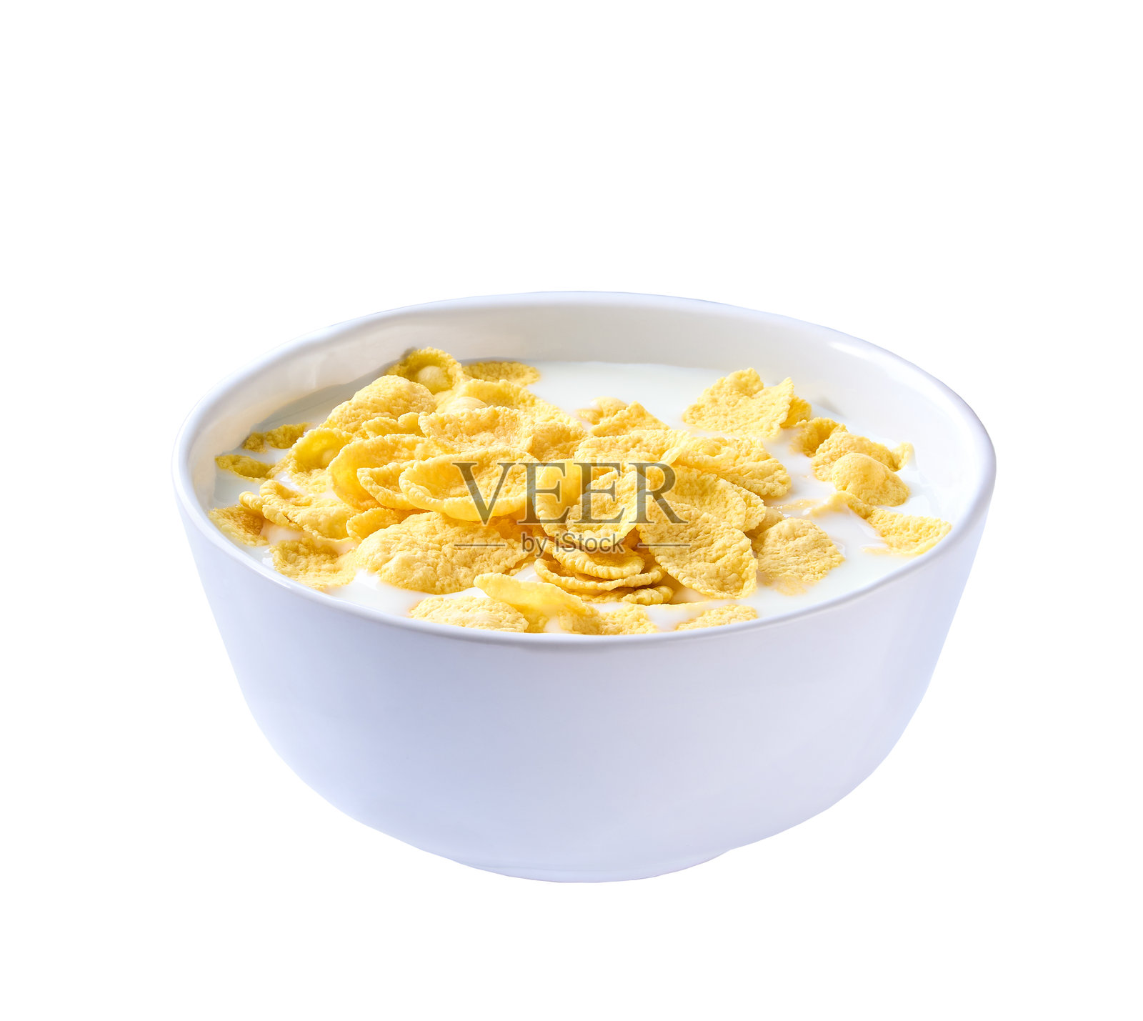 白色背景下的碗中盛有牛奶的玉米片。照片摄影图片