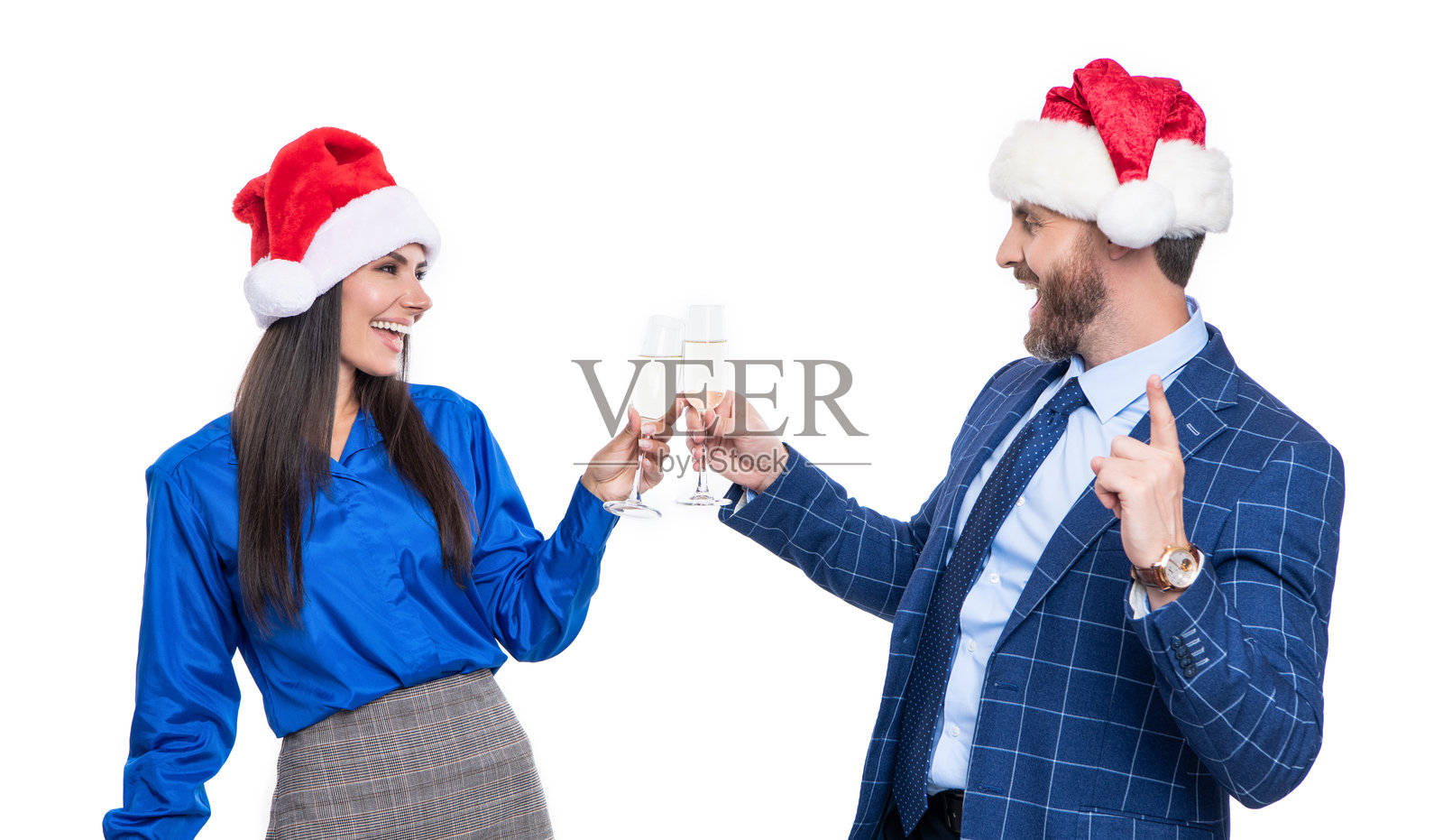 快乐的商务情侣在白色背景下庆祝圣诞节。企业圣诞派对照片摄影图片