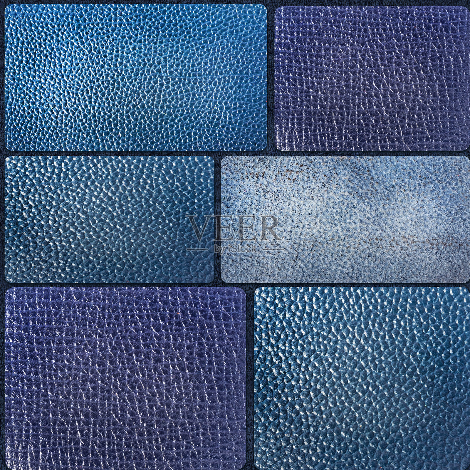 无缝的4K蓝色各种图案皮革瓷砖纹理材料照片。照片摄影图片