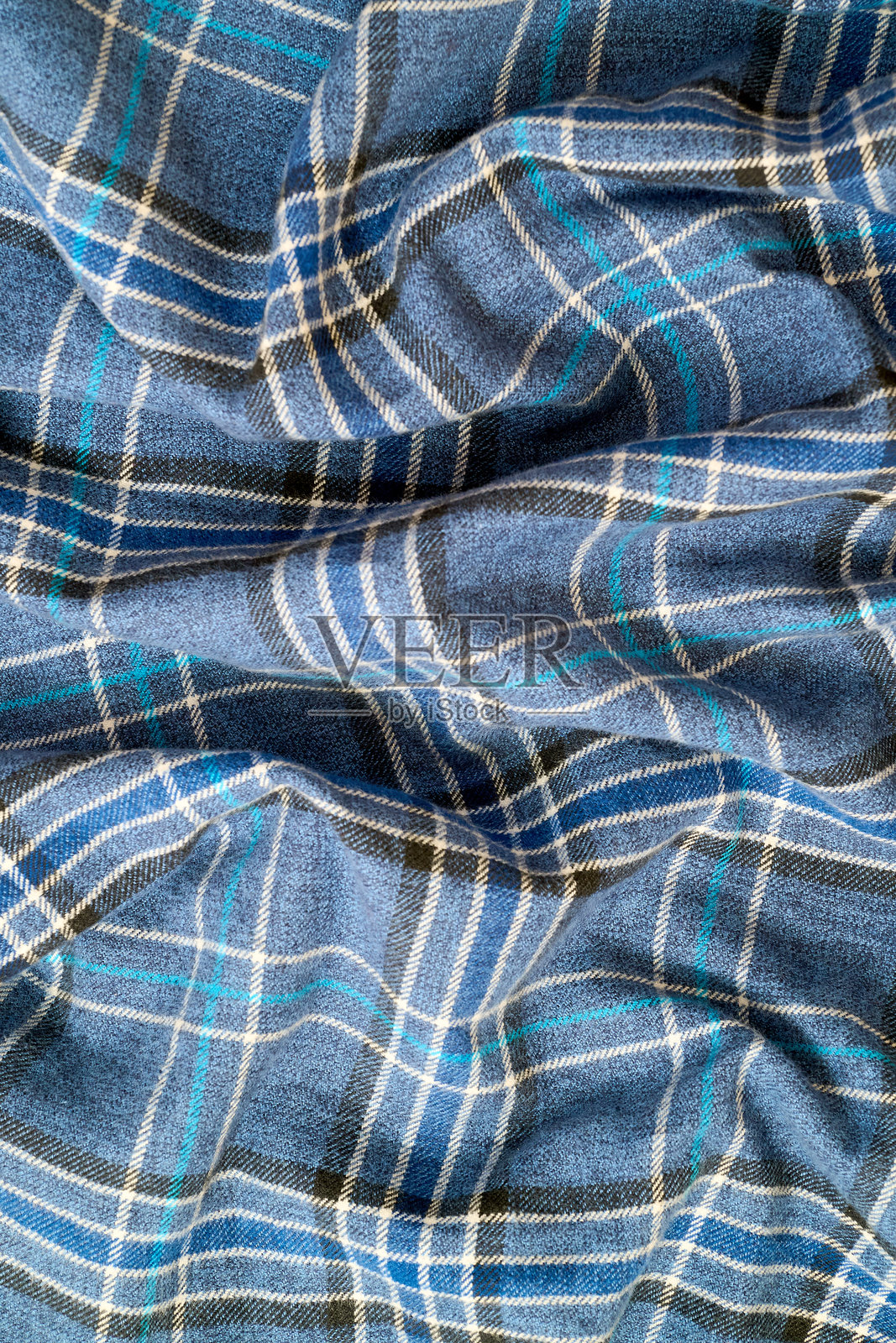 条纹在皱褶的休闲衬衫上重复出现照片摄影图片