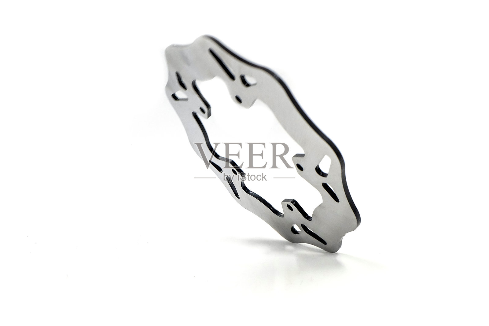 刹车转子特写，孤立在白色背景上，摩托车刹车盘照片摄影图片