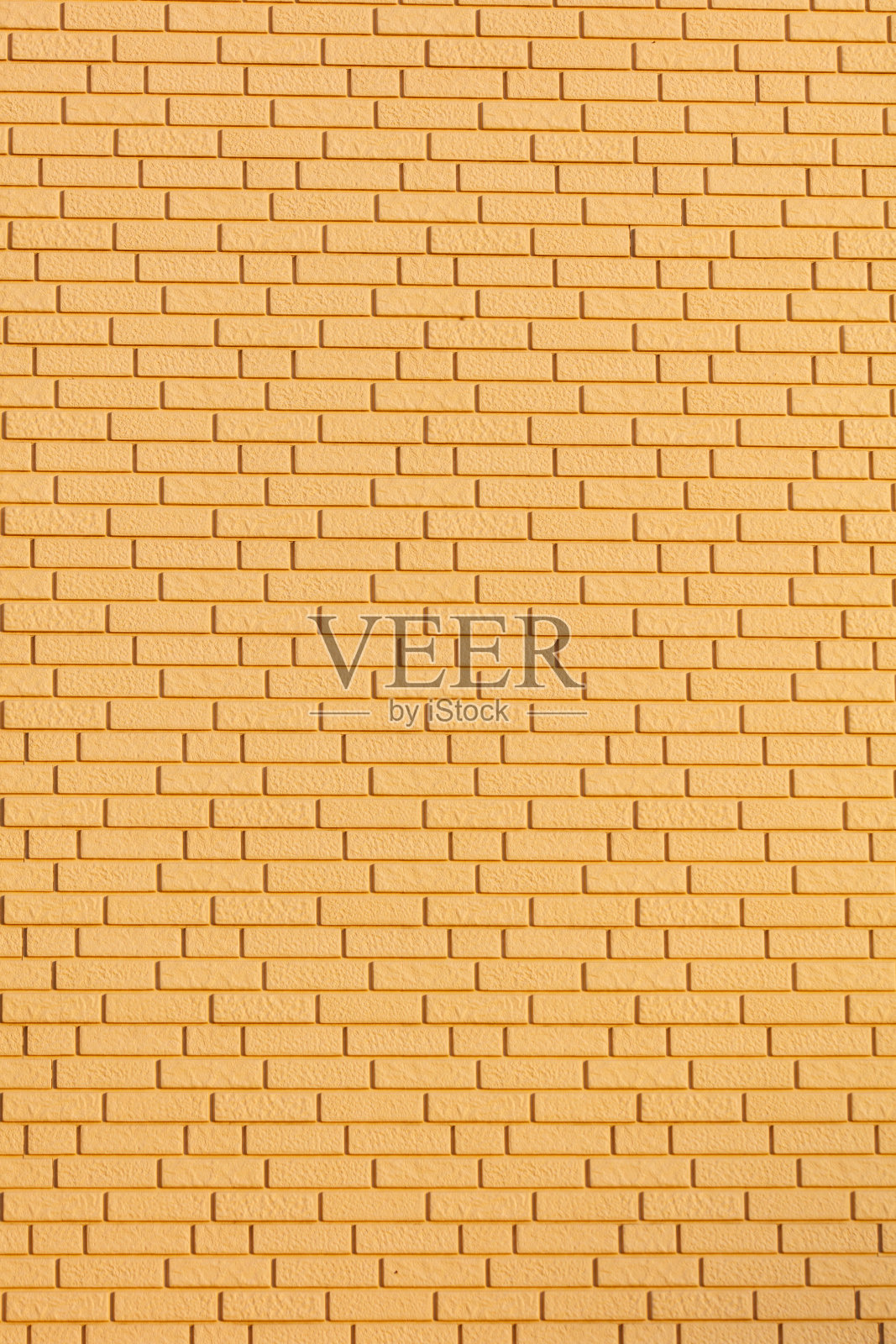 一面由黄色砖块构成的墙照片摄影图片