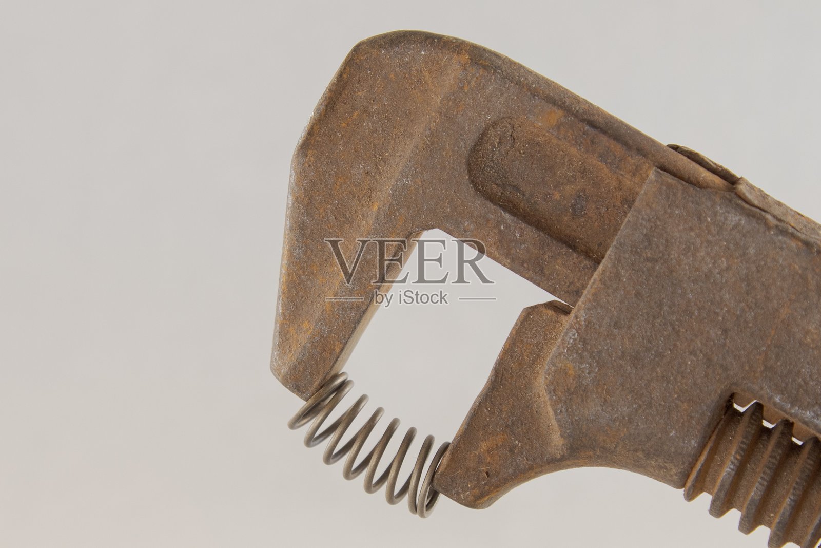 老式扳手压扁金属弹簧照片摄影图片